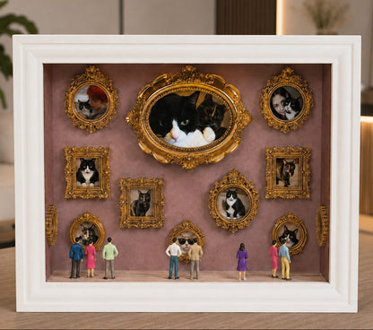 A white shadow box display on a wooden surface, featuring miniature figures and multiple gold-framed portrait frames containing photos of pets, museum of us, pet memories, gift for pet lovers, handmade and personalised museum of us and pets